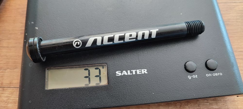 Oś Accent EVO przód 100x12mm M12x1.5 dł 124mm