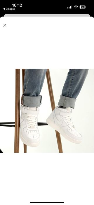 Белые кожаные кроссовки Nike Air Force 1 Mid.