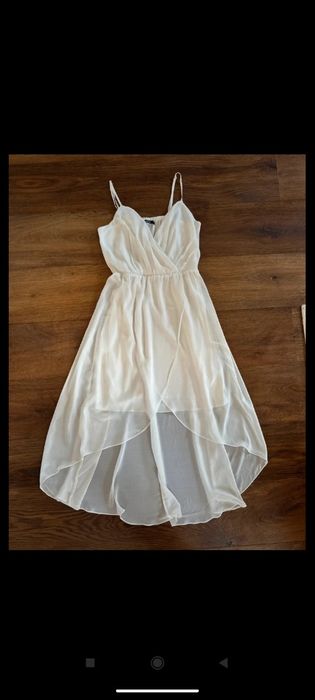 Elegancka biała midi sukienka