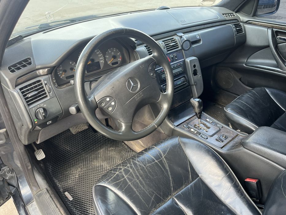 Мерседес Бенз 210