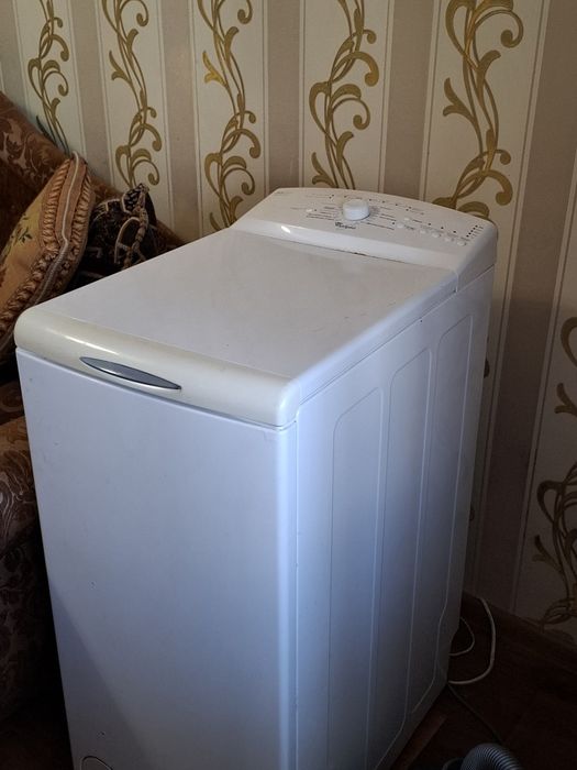 Вертикальна пральна машина Whirpool