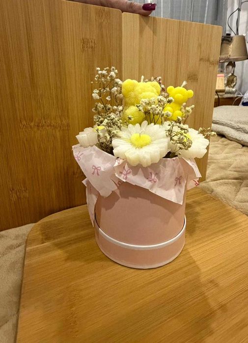 Vasos de flores em vela