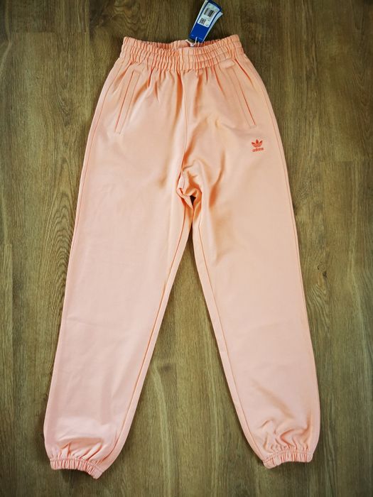 Adidas spodnie damskie dresowe sportowe bawełna brzoskwiniowy rozmiar xs 34 s 36