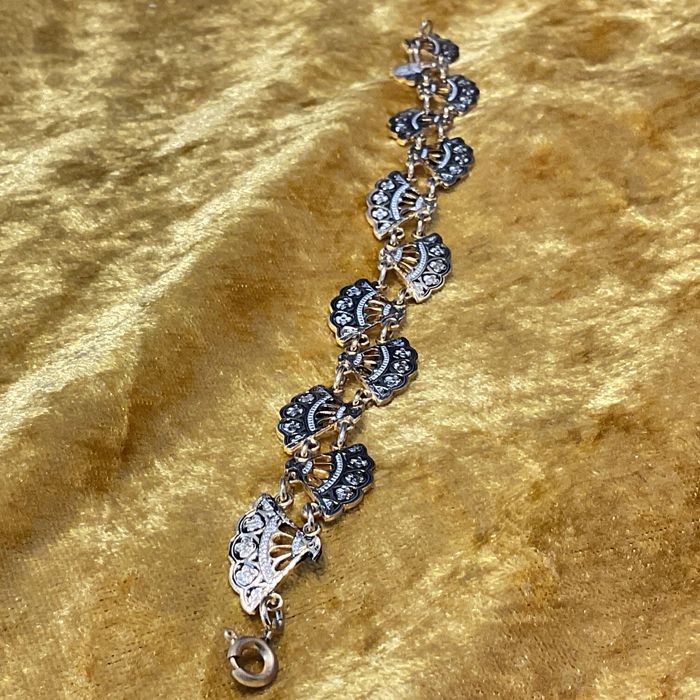 Pulseira tema leques cor ouro 20 cm