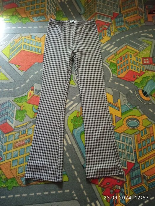 Spodnie dla dziewczynki Reserved rozmiar 158