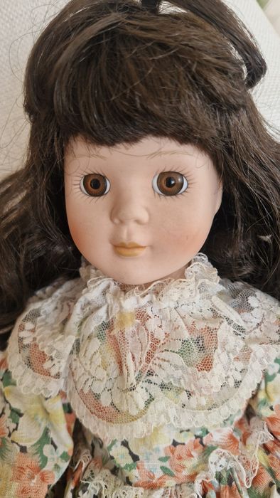 Bonecas em porcelana