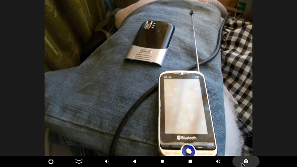 Сенсорный телефон данод . телевизор