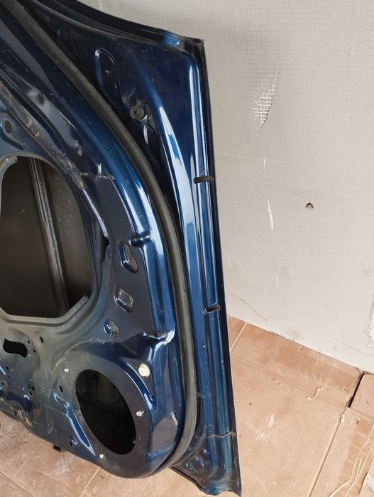 Дверка задня права Тойотв Авенсіс Т25