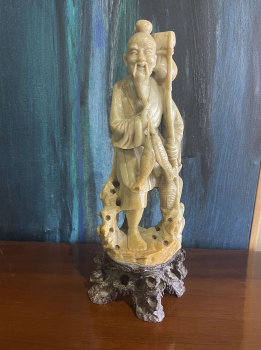 Escultura oriental - Pescador