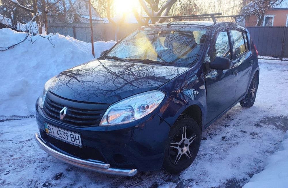 Рено сандеро 1.4 газ бензин
