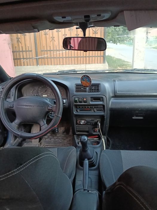 Мазда 323 F BA .
