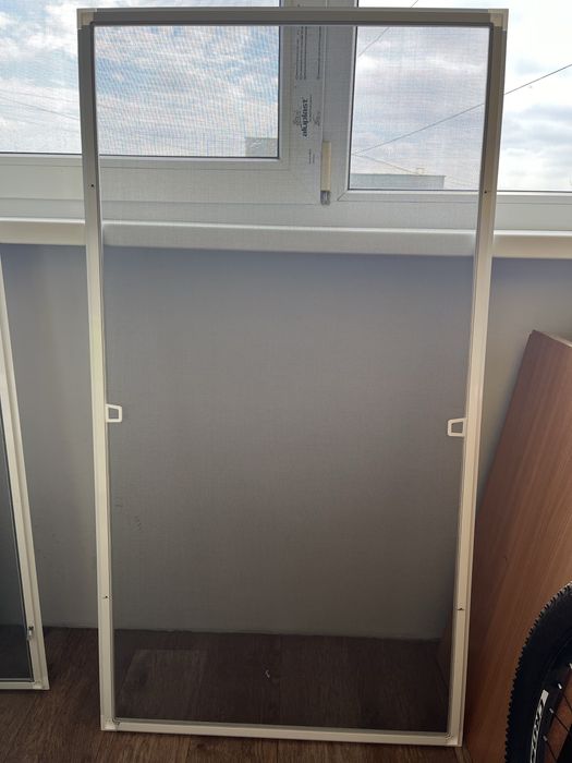 Маскитная сетка (новая)2шт.675*1285 и 670*1270.