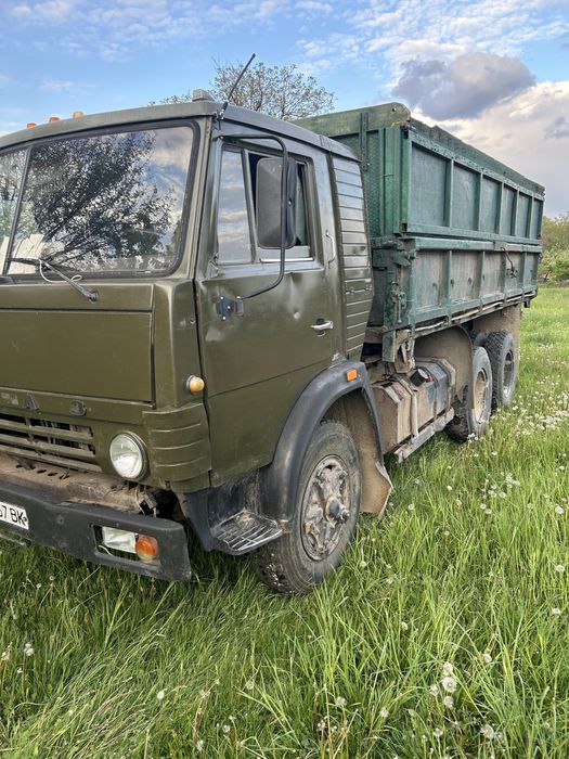 Камаз самоскид з причепом.