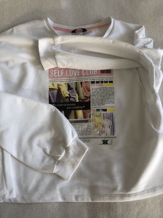 Biała bluza damska krótka