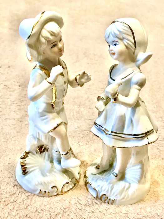 Вінтажні парцелянові статуетки.