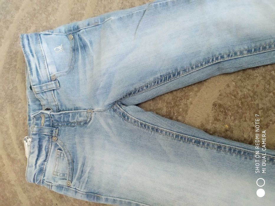 Nowe Benetton jeansy śliczne jasnoniebieske