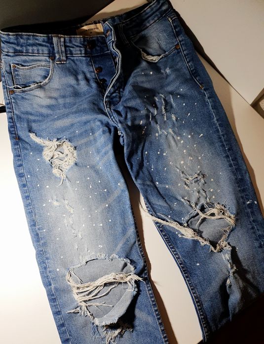Spodnie jeans z rozdarciami