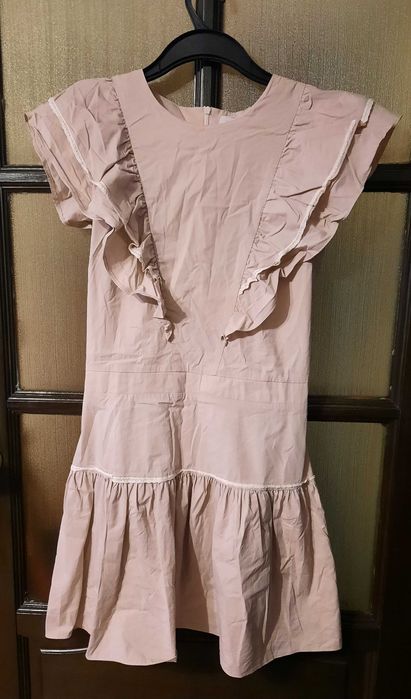 Sukienka z falbanką. Krótka.