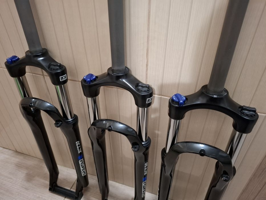ВЕЛОсипедные вилки 27.5 пруж.масло Lockout SR Suntour XCT HLO.