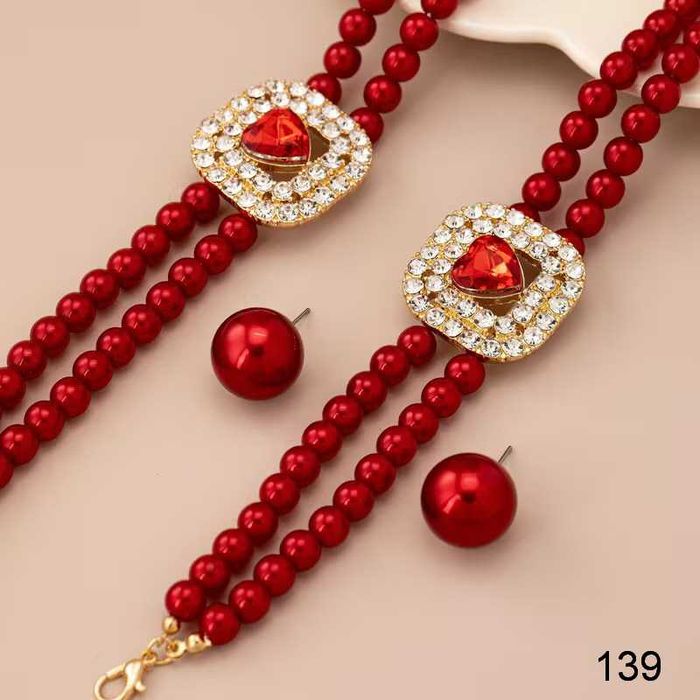 Елегантний комплект з перлами та стразами, кольє-чокер та сережки