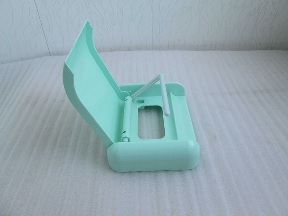 Держатель на туалетной бумаги.