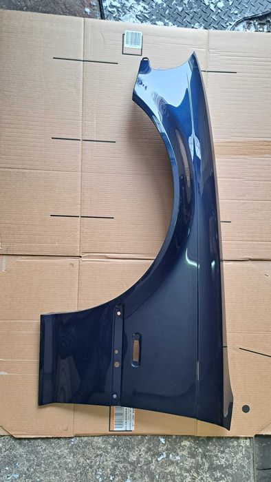 Błotnik BMW E46 Coupe Cabrio lewy ,prawy Orientblau met kod koloru 317