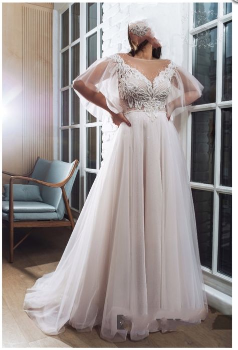 Suknia ślubna z odpinanymi rękawkami