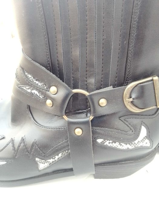 Botas de cowboy em pele