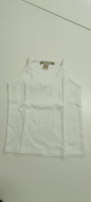 Blusa branca, sem mangas para criança 4/5 anos. Usada