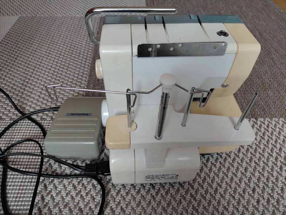 Оверлок privilege 303