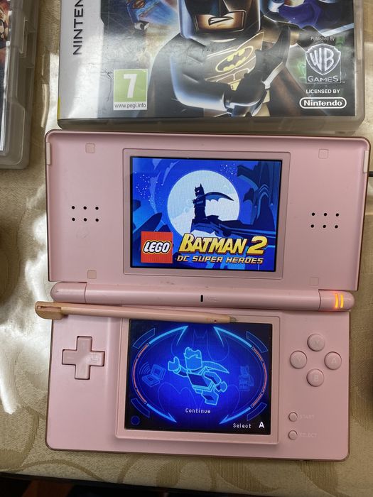 Pack consola DSi + 15 jogos e porta jogos