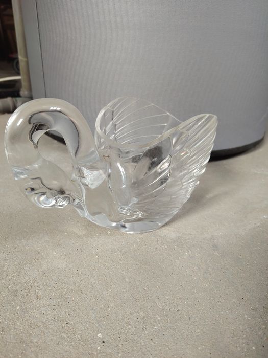 Peça em formato de cisnei