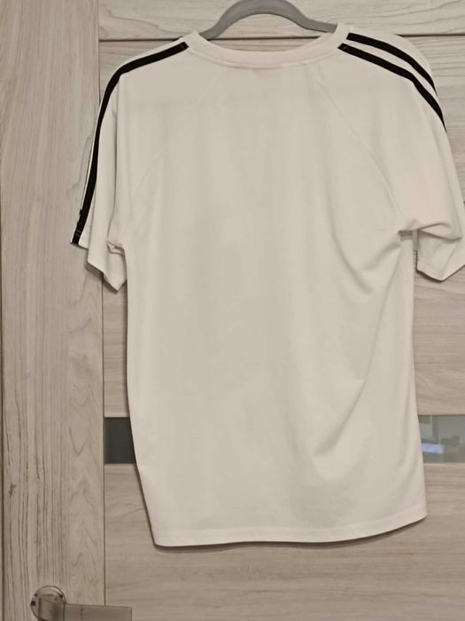 Puma x Ferrari Sportowy T-shirt – Mistrzowski Styl i Prędkość!