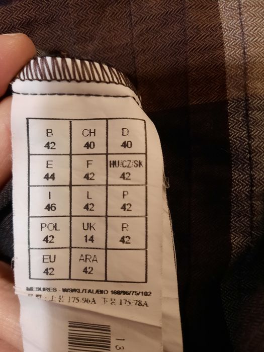 Sukienka w kratkę firmy Promod