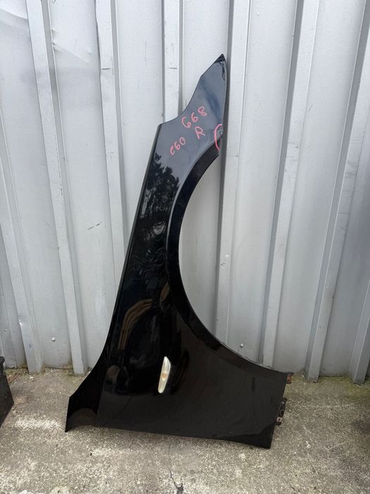 Błotnik prawy e60 e61 668 Schwarz 2  oryginalny aluminiowy