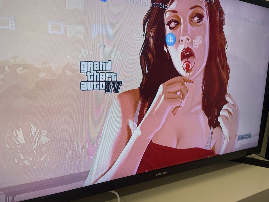 Playstation 3 Slim + 14 jogos + comando + cabos