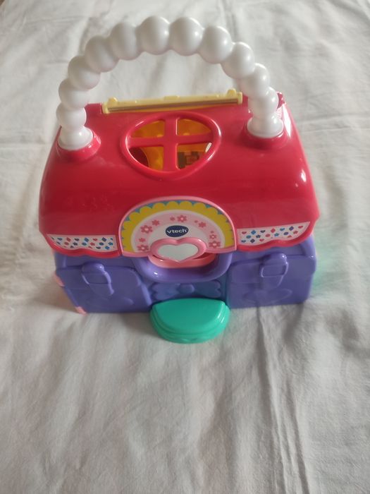 Brinquedo mala casa