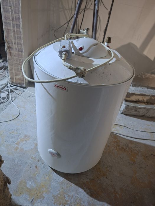 Водонагреватель  в рабочем состояние