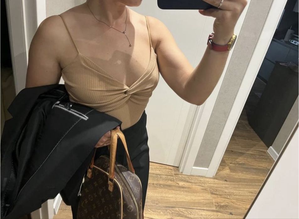 Бавовняне бежеве боді в рубчик