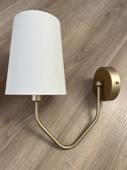 Złote kinkiety lampy