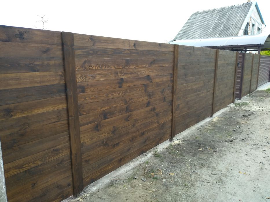 Ворота, заборы из дерева и металла.