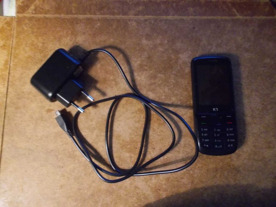 carregador de telemovél K1