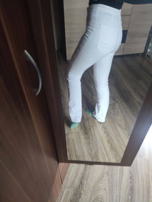 Białe spodnie damskie dzwony r XS