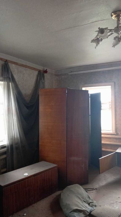 продам кирпичный дом в сел.Лизогубовка 45м2,участок 25соток,летняя кухня 56м2