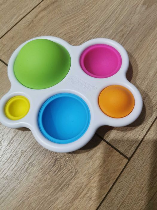 Dimpl fat brain toys + wieża Fisher price