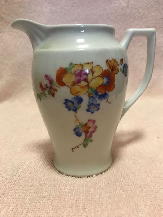 Zabytkowy mlecznik Art Deco