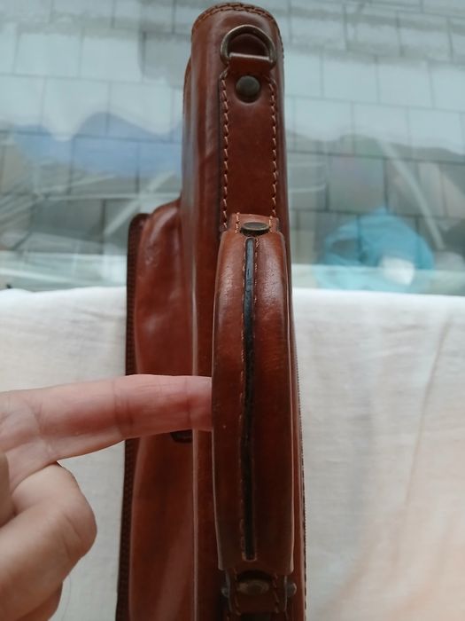 Pasta de executivo/professor, em couro.