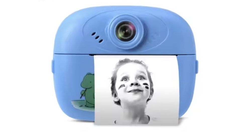 Дитячий фотоапарат з миттєвим друком, картою пам'яті,іграми та селфі.