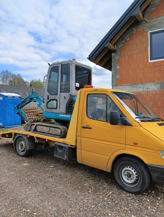 Usługi minikoparką transport autolaweta