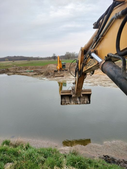 Usługi koparką, pracę ziemne, wykopy, wyburzenia